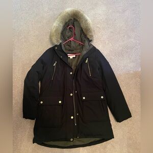 Michael Kors black mid thigh parka with faux-fur hood trim and multiple pockets